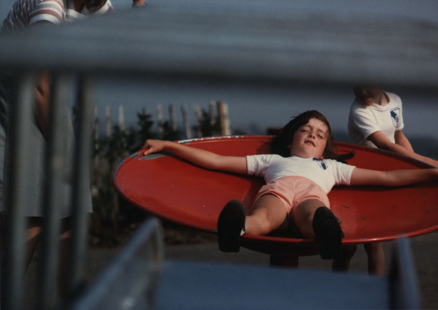 Colour photograph of child at a playground